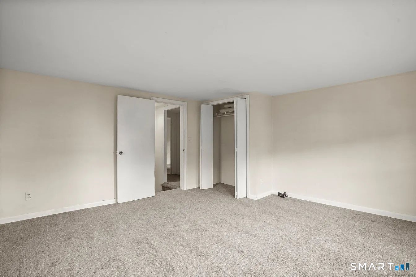 25 Pleasant Street Ansonia, CT 06401 - Photo 11 of 16 a view of an empty room and window