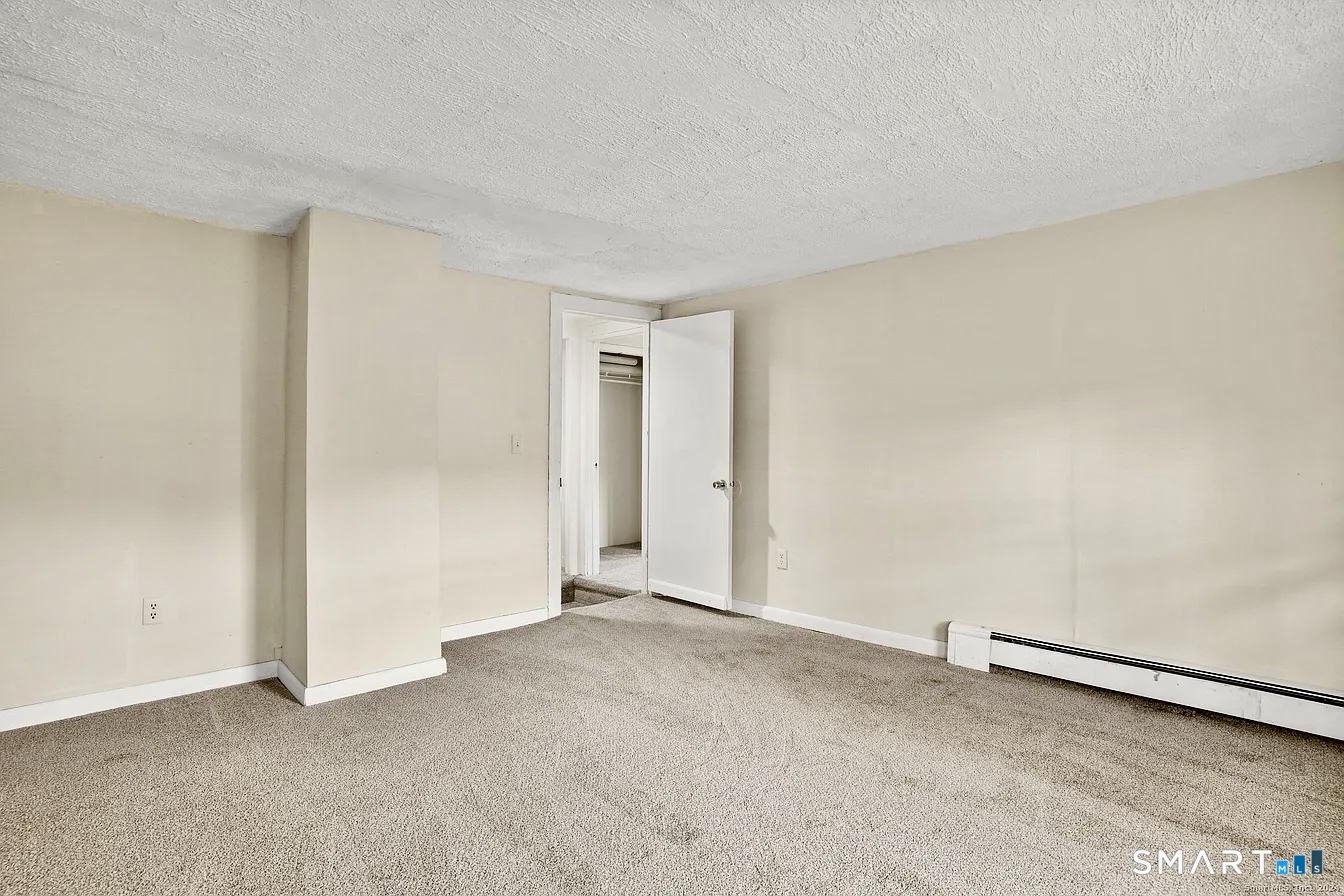 25 Pleasant Street Ansonia, CT 06401 - Photo 7 of 16 a view of an empty room