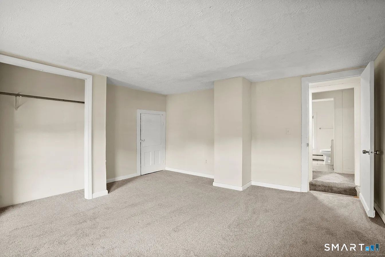 25 Pleasant Street Ansonia, CT 06401 - Photo 10 of 16 a view of an empty room