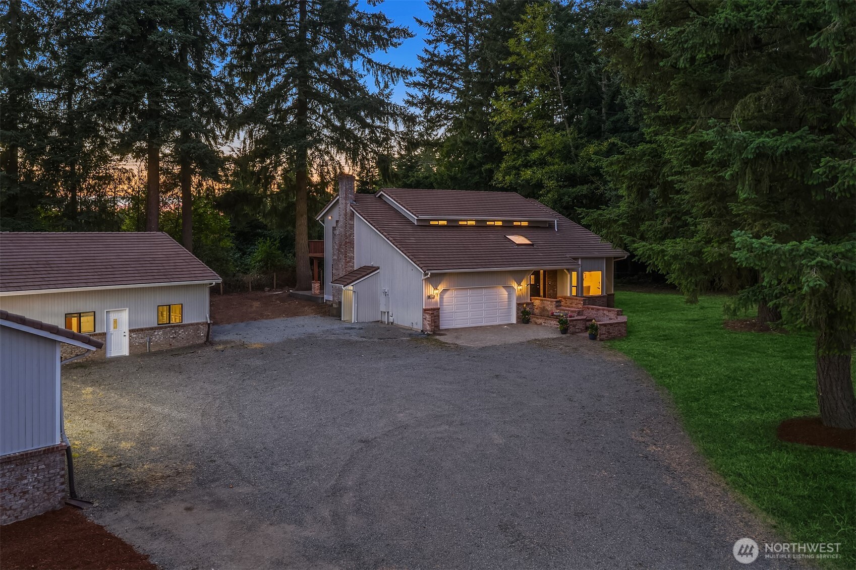 22918 49th Avenue Southeast Bothell, WA 98021 - Photo 36 of 38 a front view of a house with a yard