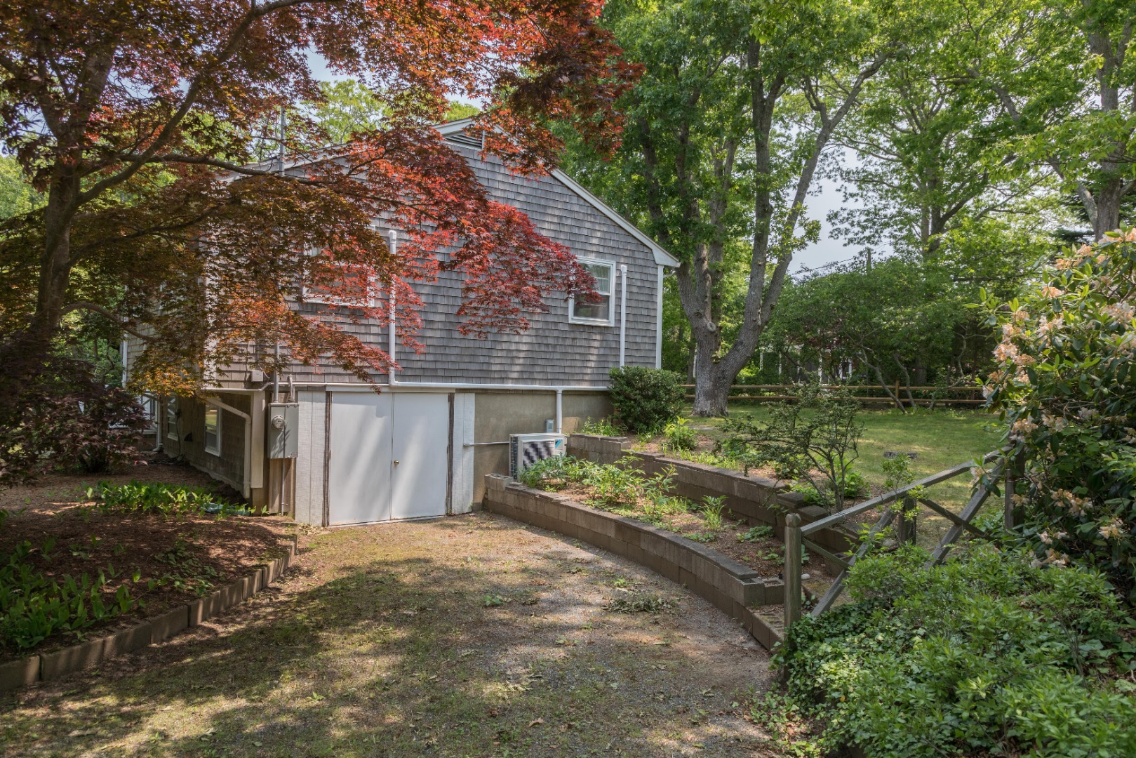 35 East Side Road Oak Bluffs, MA 02557 - Photo 32 of 41 Side View of Home with Walkout Access