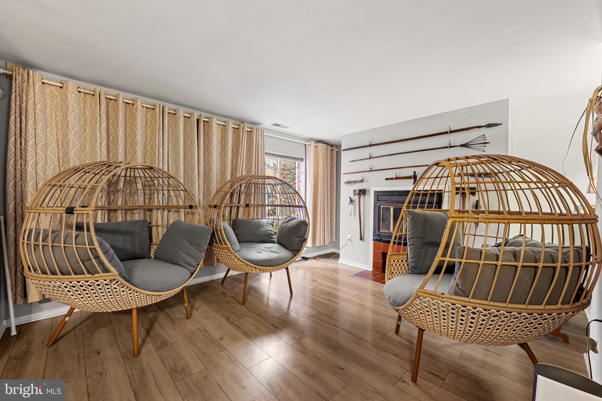 526 South Charles Street, Unit R79 Baltimore, MD 21201 - Photo 4 of 21 a living room with furniture and a wooden floor