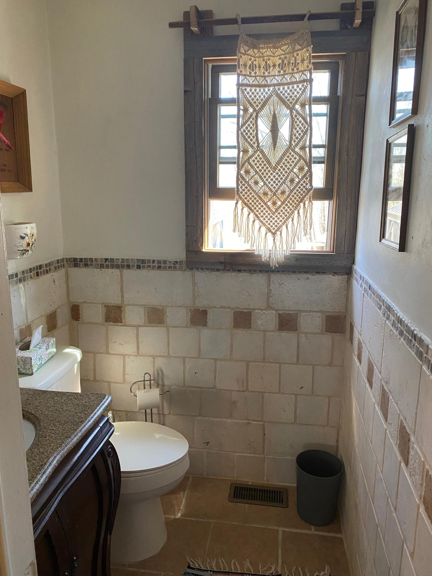 337 Tara Hill Road Bartonsville, PA 18321 - Photo 24 of 37 a bathroom with a toilet a sink and a window