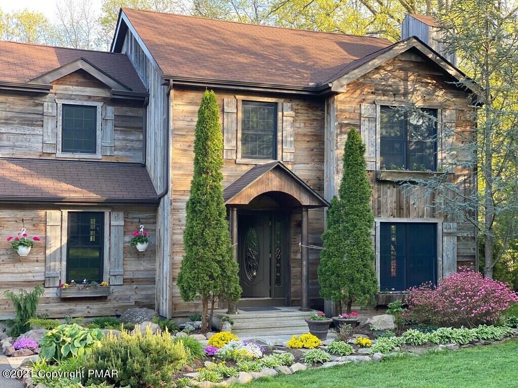 337 Tara Hill Road Bartonsville, PA 18321 - Photo 3 of 37 a front view of a house with garden