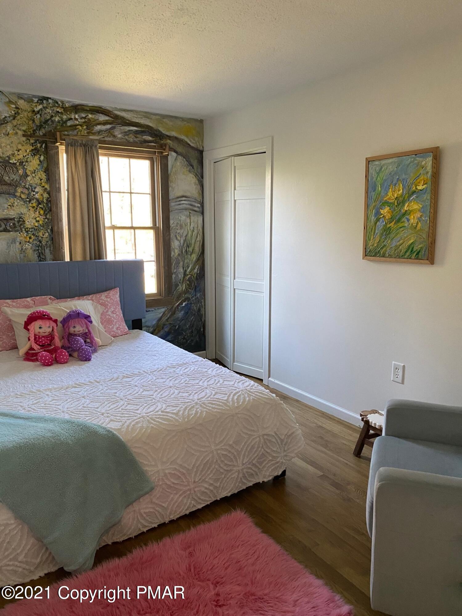 337 Tara Hill Road Bartonsville, PA 18321 - Photo 31 of 37 a bedroom with a bed and window