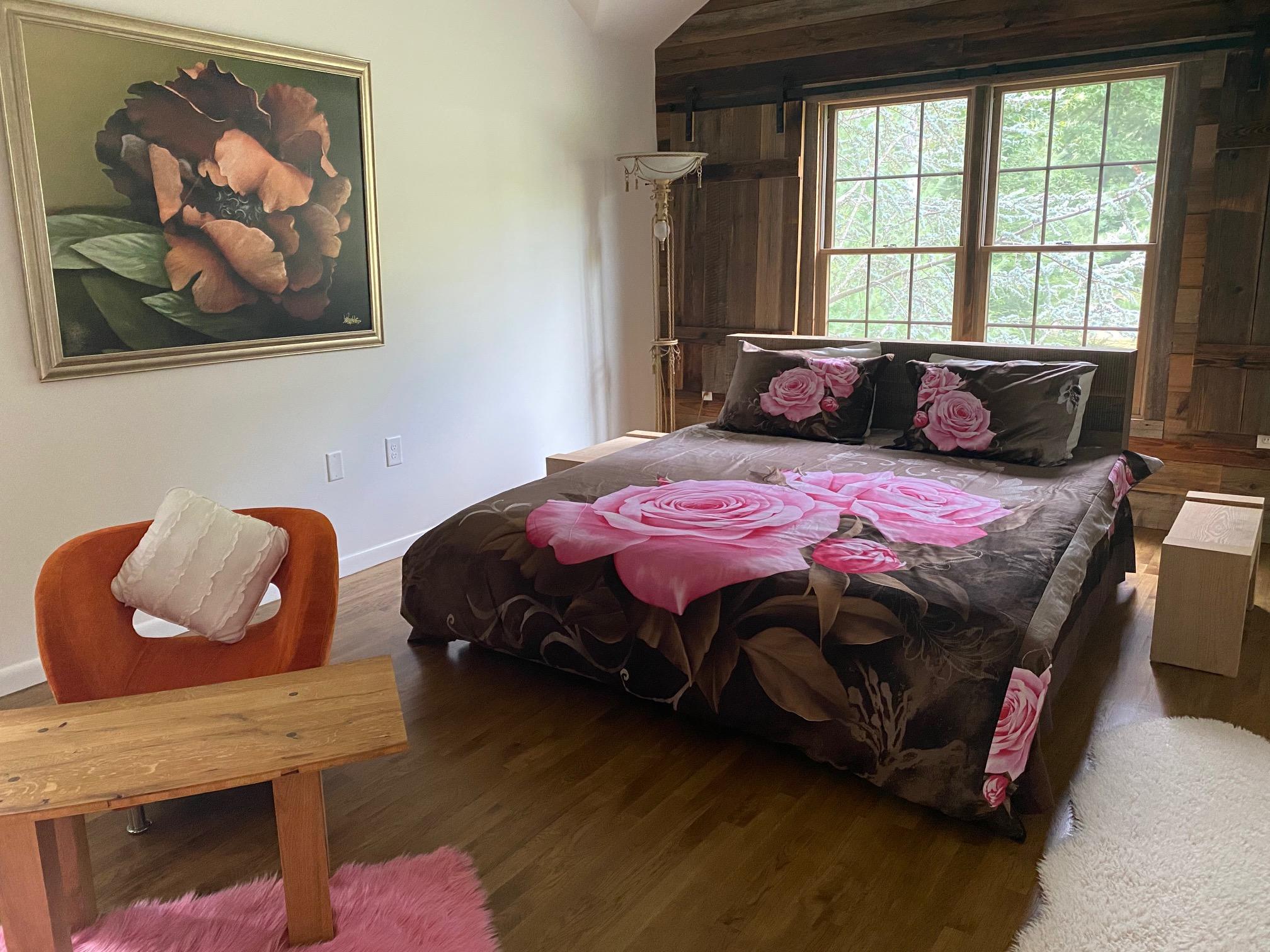 337 Tara Hill Road Bartonsville, PA 18321 - Photo 33 of 37 a bedroom with a bed and wooden floor