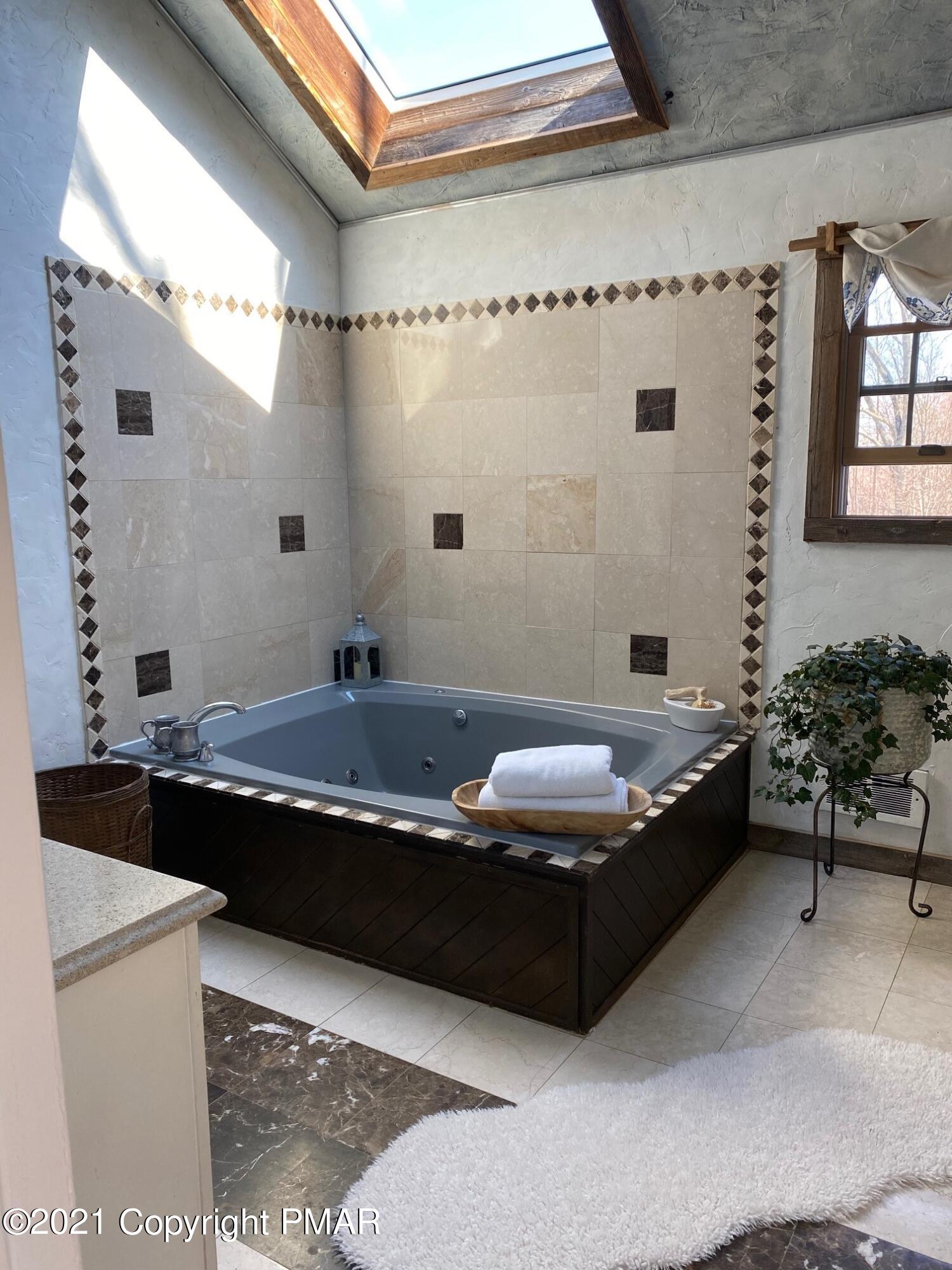 337 Tara Hill Road Bartonsville, PA 18321 - Photo 37 of 37 a view of a bath tub sitting in a bathroom