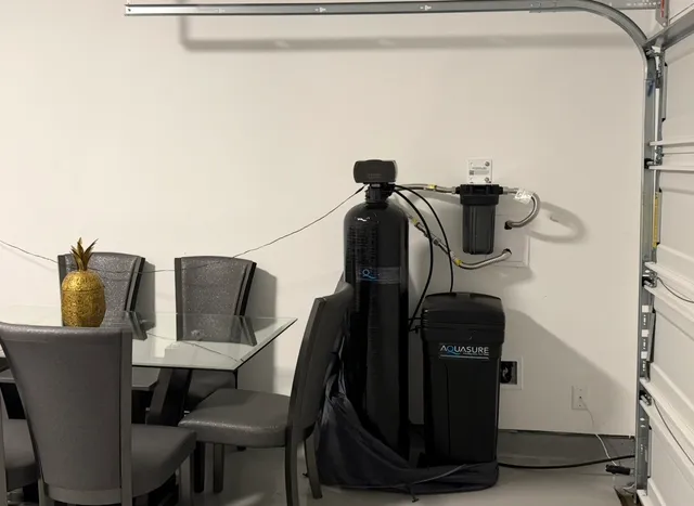 a view of storage and utility room with windows