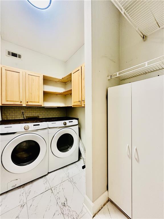 3777 Peachtree Road Northeast, Unit 1212 Atlanta, GA 30319 - Photo 20 of 27 a utility room with dryer and washer