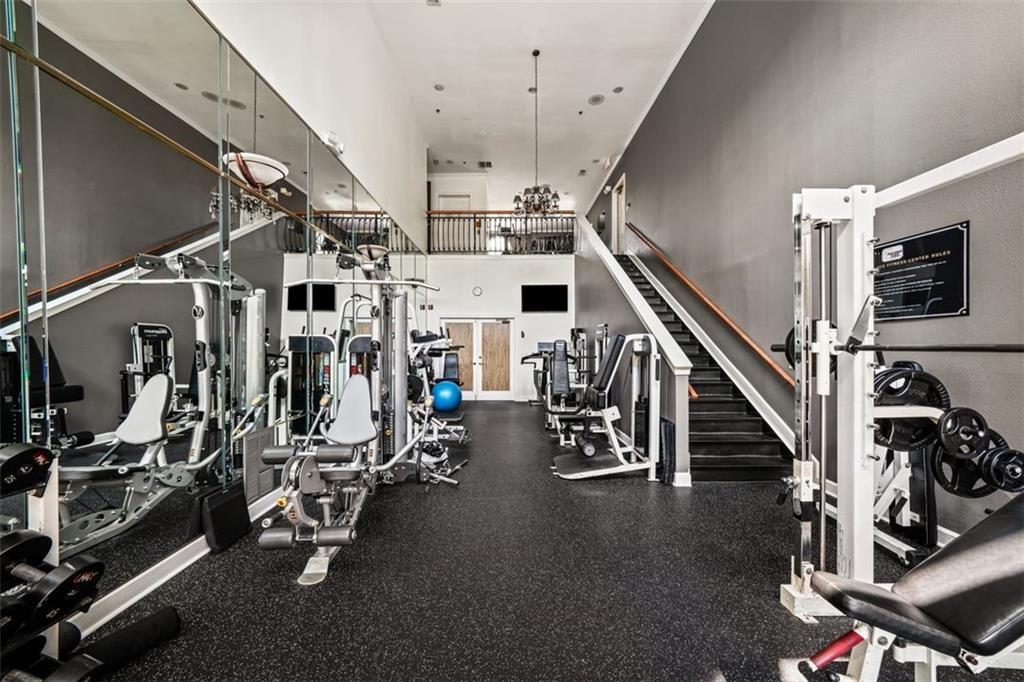 3777 Peachtree Road Northeast, Unit 1212 Atlanta, GA 30319 - Photo 23 of 27 a view of a room with gym equipment