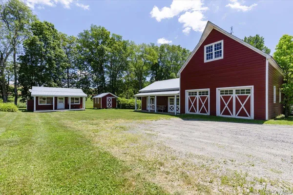 a front view of a house with yard