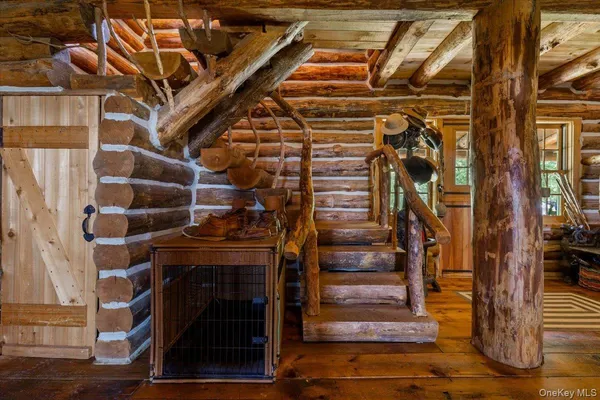 a view of entryway with wooden floor