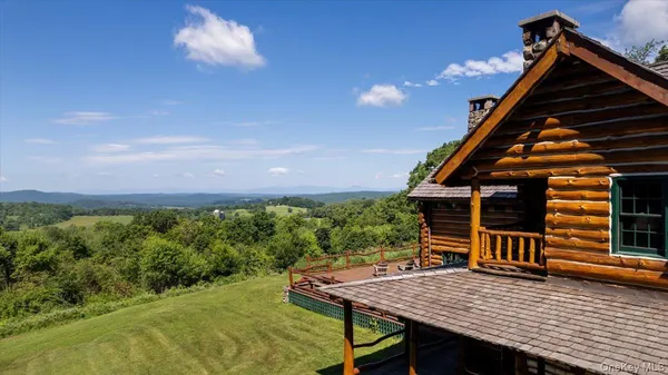 an aerial view of a house with a garden