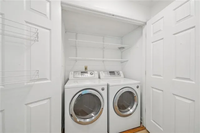 a utility room with dryer and washer