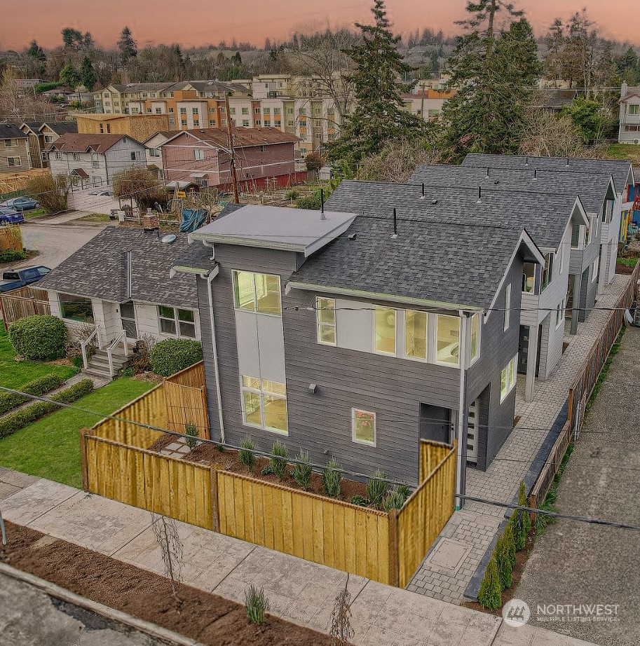 3419 36th Avenue South, Unit A Seattle, WA 98144 - Photo 1 of 23 a aerial view of a house with a yard