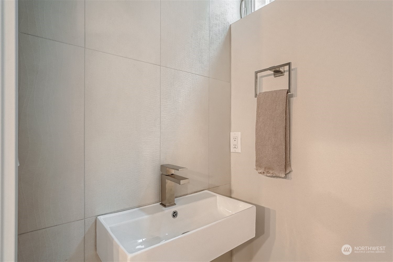 3419 36th Avenue South, Unit A Seattle, WA 98144 - Photo 11 of 23 a bathroom with a sink and mirror