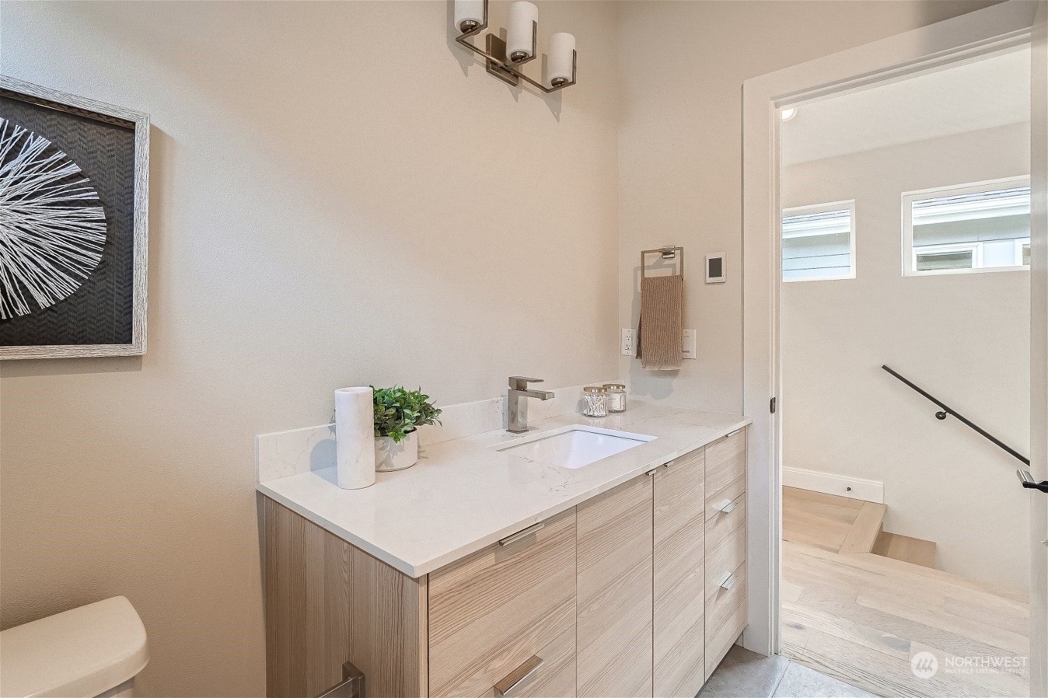 3419 36th Avenue South, Unit A Seattle, WA 98144 - Photo 16 of 23 a bathroom with a sink and a toilet