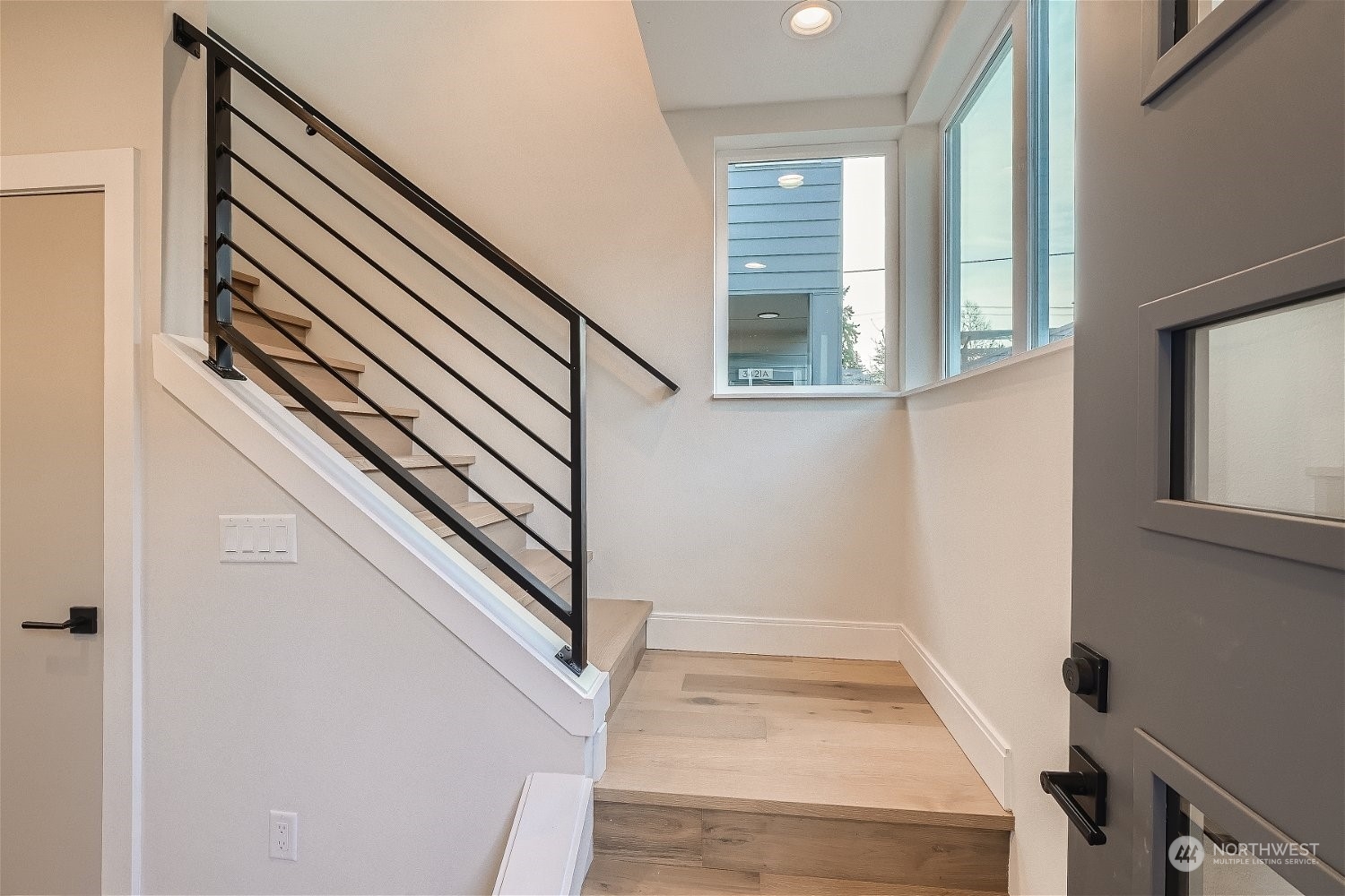 3419 36th Avenue South, Unit A Seattle, WA 98144 - Photo 2 of 23 a view of staircase with white walls and a window