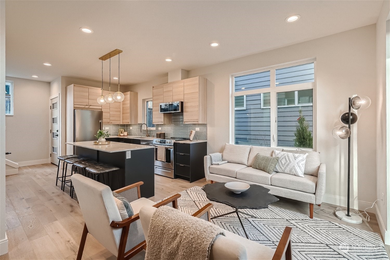 3419 36th Avenue South, Unit A Seattle, WA 98144 - Photo 3 of 23 a living room with furniture and kitchen view