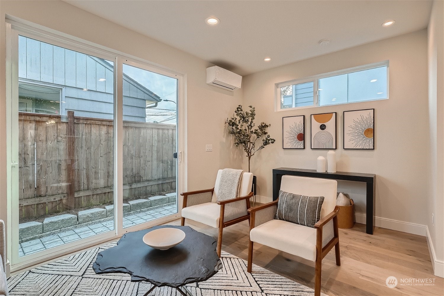 3419 36th Avenue South, Unit A Seattle, WA 98144 - Photo 5 of 23 a living room with furniture and a potted plant