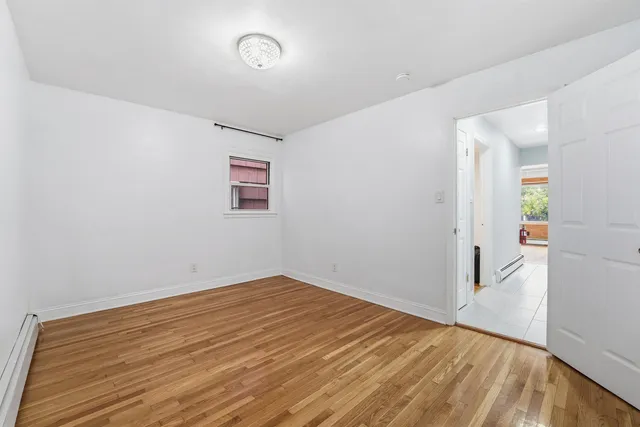 a bathroom with a sink a toilet and vanity