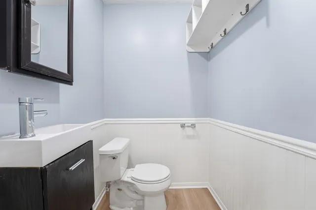 a view of a building with car parked