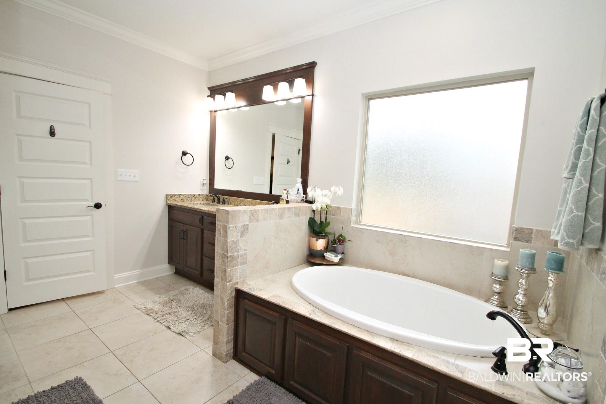 30232 Persimmon Drive Daphne, AL 36527 - Photo 14 of 27 Bathroom with tile patterned floors, a garden tub, vanity, and crown molding