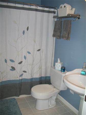 80 Mallowhill Road Springfield, MA 01129 - Photo 12 of 30 a white toilet sitting next to a bath tub