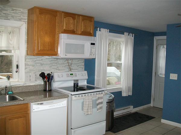 80 Mallowhill Road Springfield, MA 01129 - Photo 5 of 30 a kitchen with a sink and cabinets