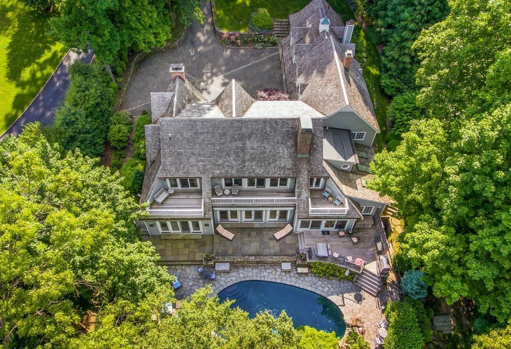 123 Long Neck Point Road Darien, CT 06820 - Photo 2 of 41 an aerial view of a house with a garden