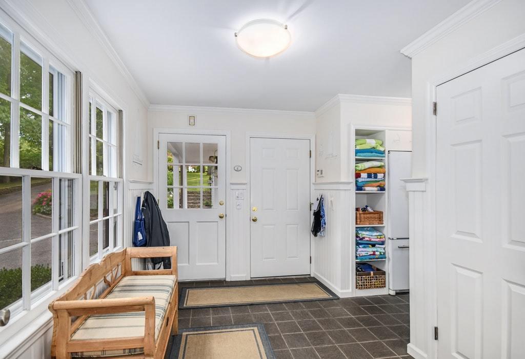 123 Long Neck Point Road Darien, CT 06820 - Photo 12 of 41 a view of room with furniture and windows