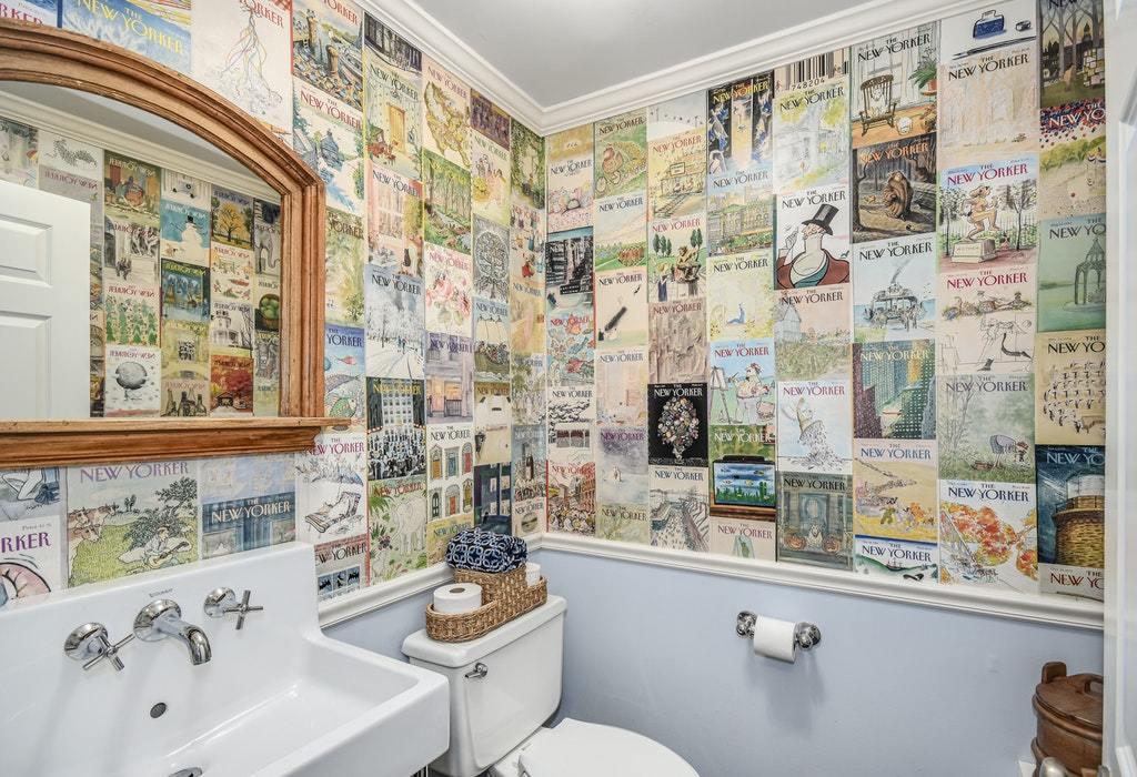 123 Long Neck Point Road Darien, CT 06820 - Photo 13 of 41 a bathroom with a sink a toilet and a shower curtain