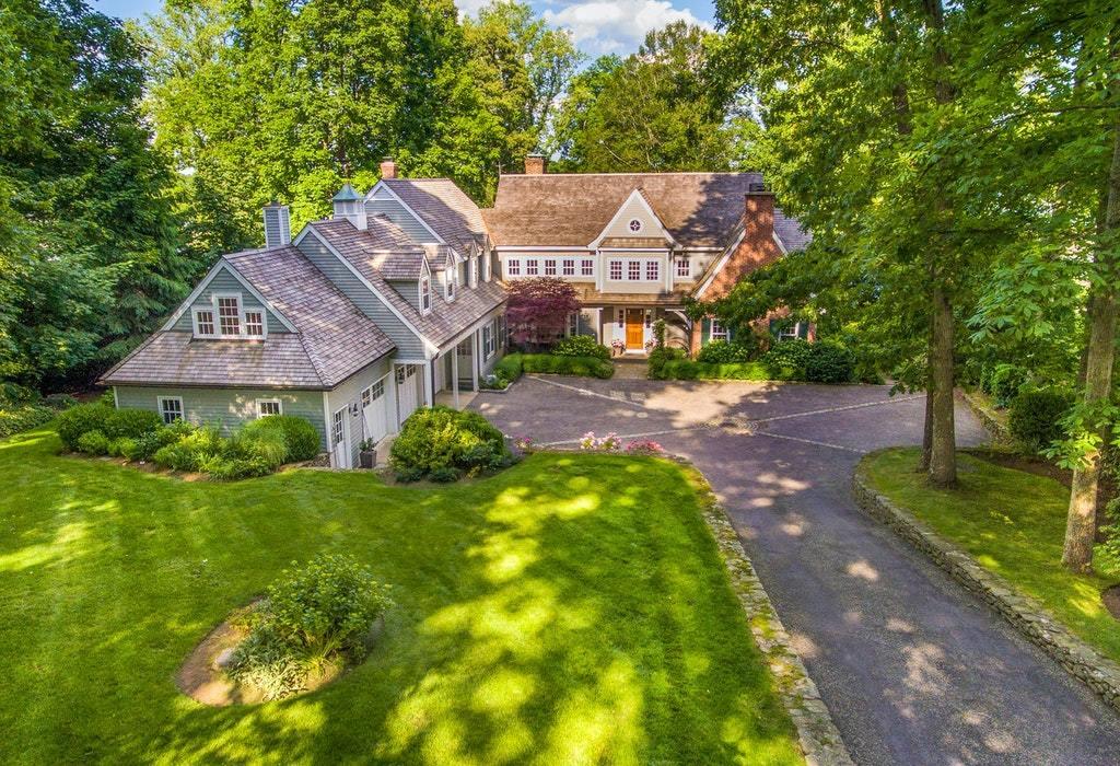 123 Long Neck Point Road Darien, CT 06820 - Photo 3 of 41 a view of a big garden with plants and large trees