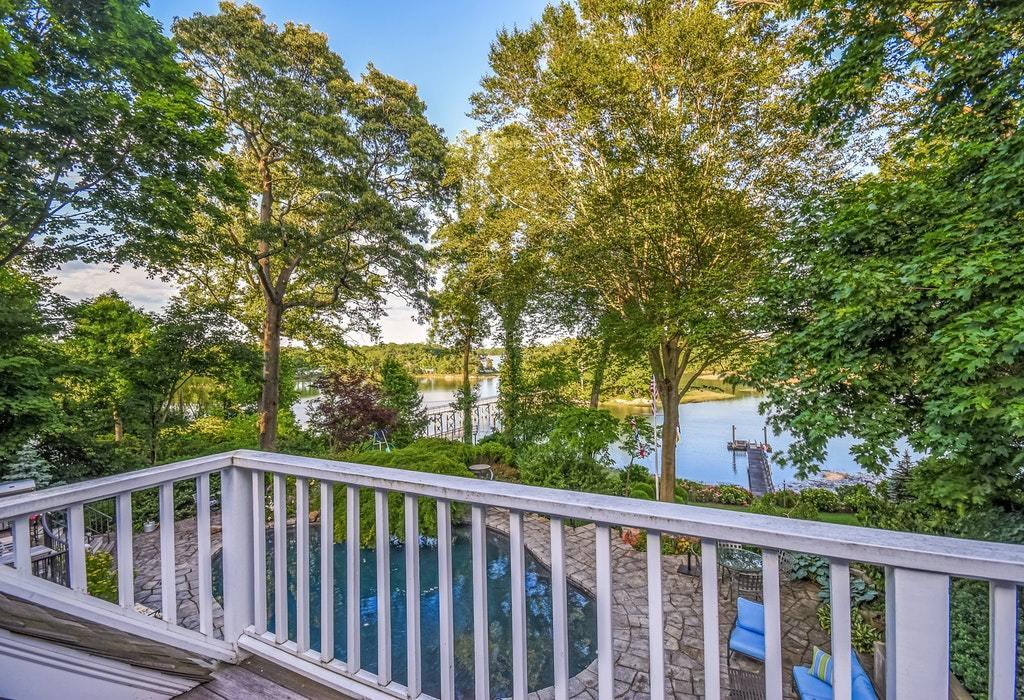 123 Long Neck Point Road Darien, CT 06820 - Photo 24 of 41 a balcony with trees
