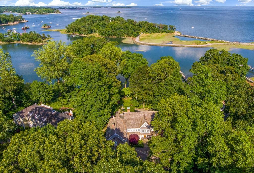 123 Long Neck Point Road Darien, CT 06820 - Photo 36 of 41 an aerial view of a house with a lake view