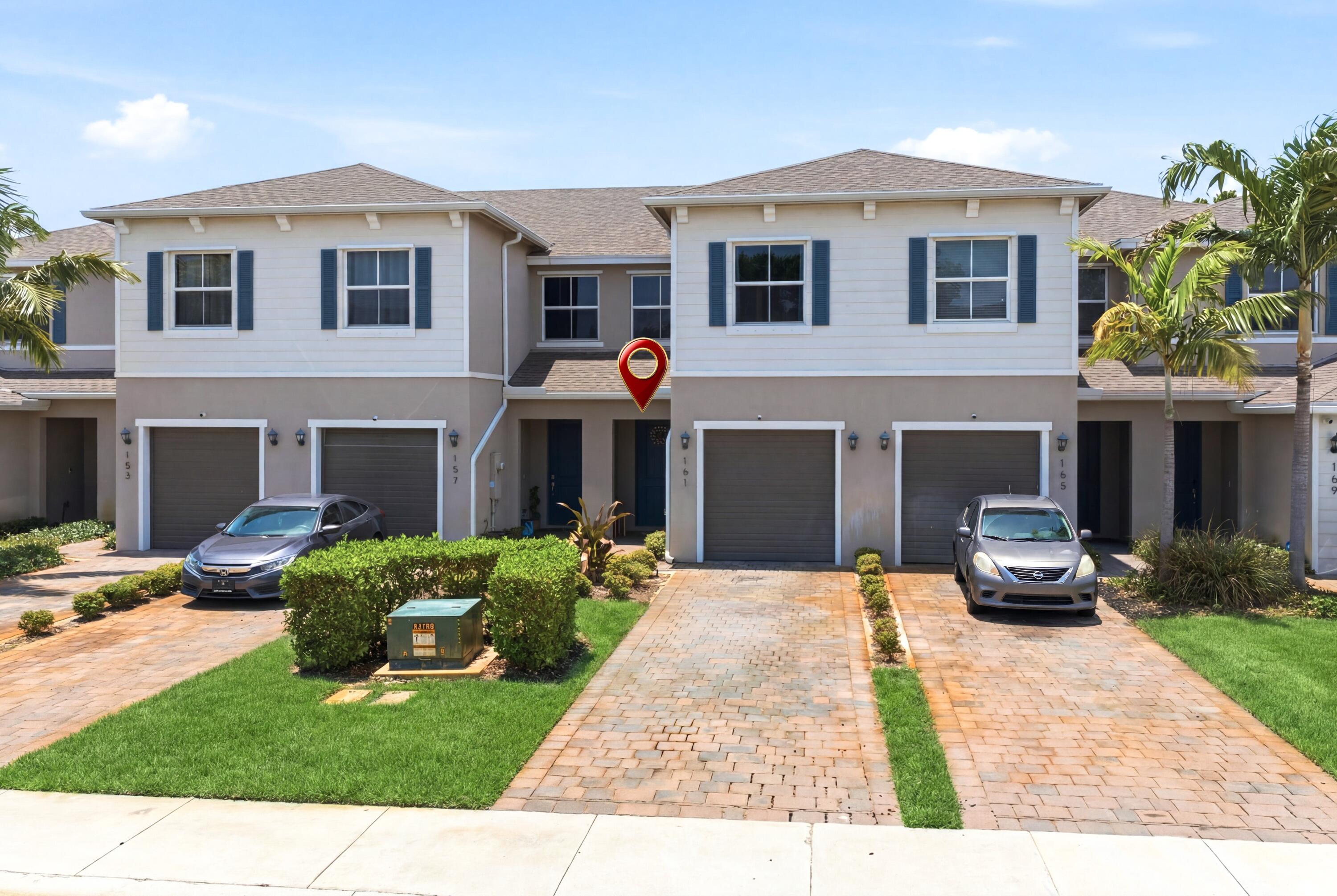 161 Bandol Street Riviera Beach, FL 33404 - Photo 1 of 21 DJI_20260627130217_0032_D_grass_52dc6fd6