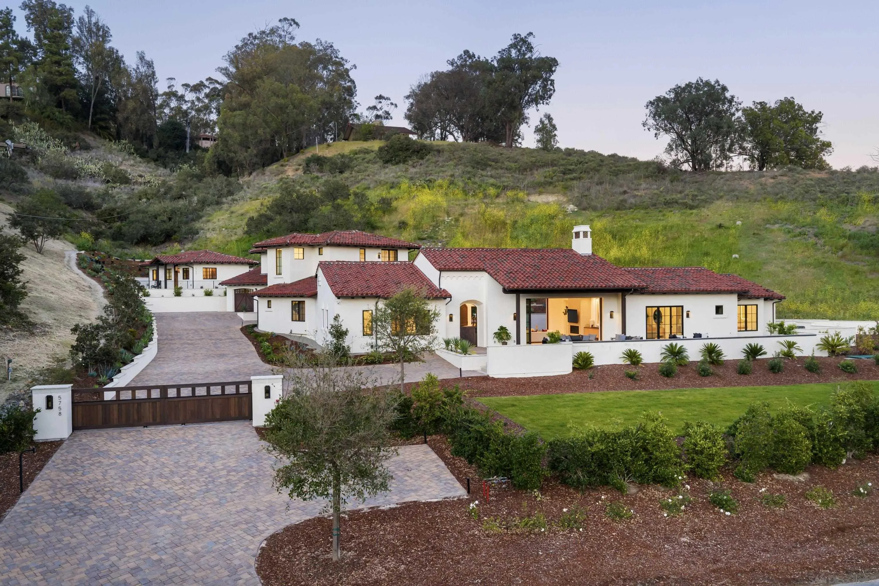 5758-60 Las Palomas Rancho Santa Fe, CA 92067 - Photo 11 of 64 a front view of a house with garden