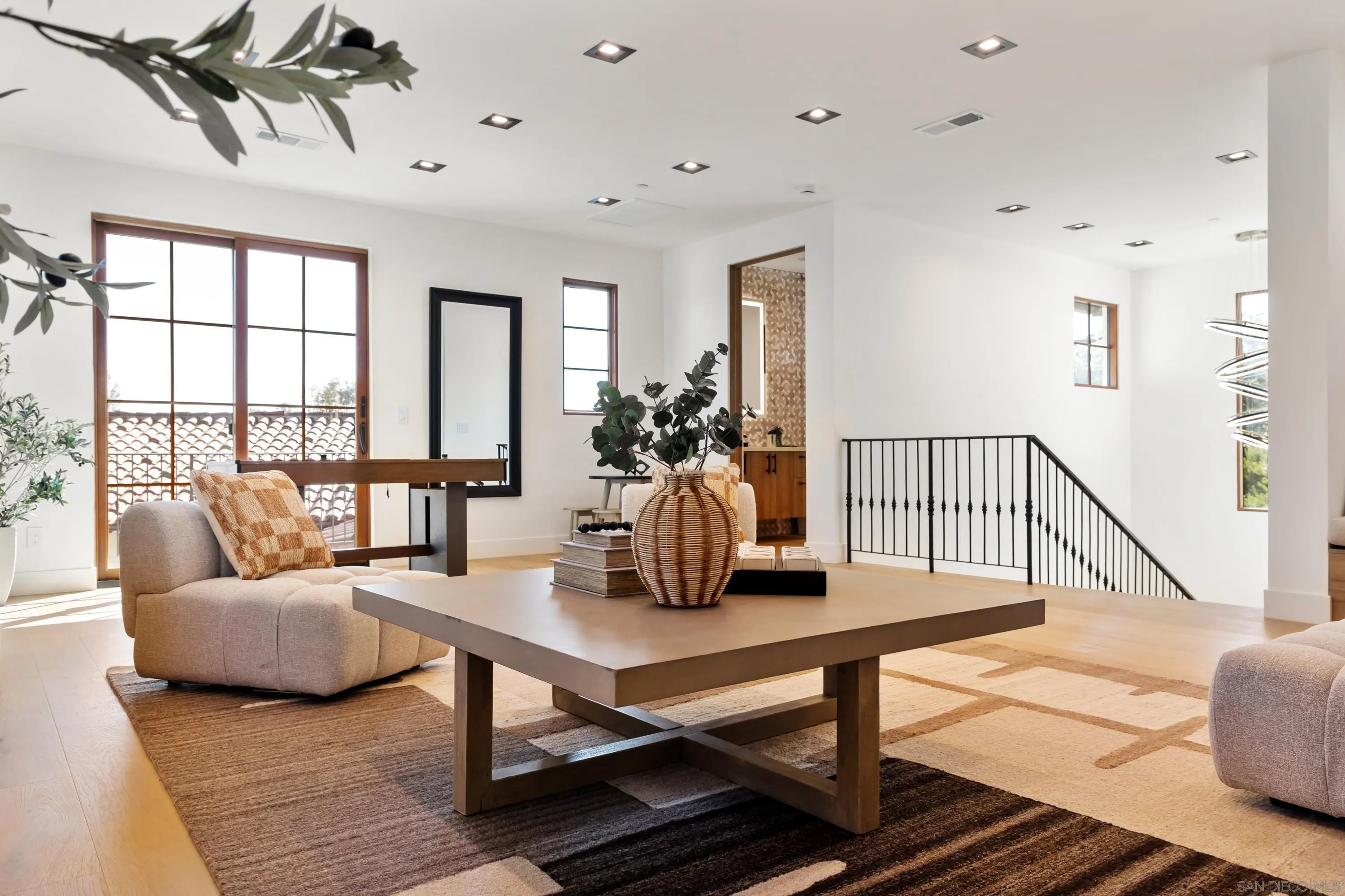5758-60 Las Palomas Rancho Santa Fe, CA 92067 - Photo 39 of 64 a dining room with furniture and wooden floor