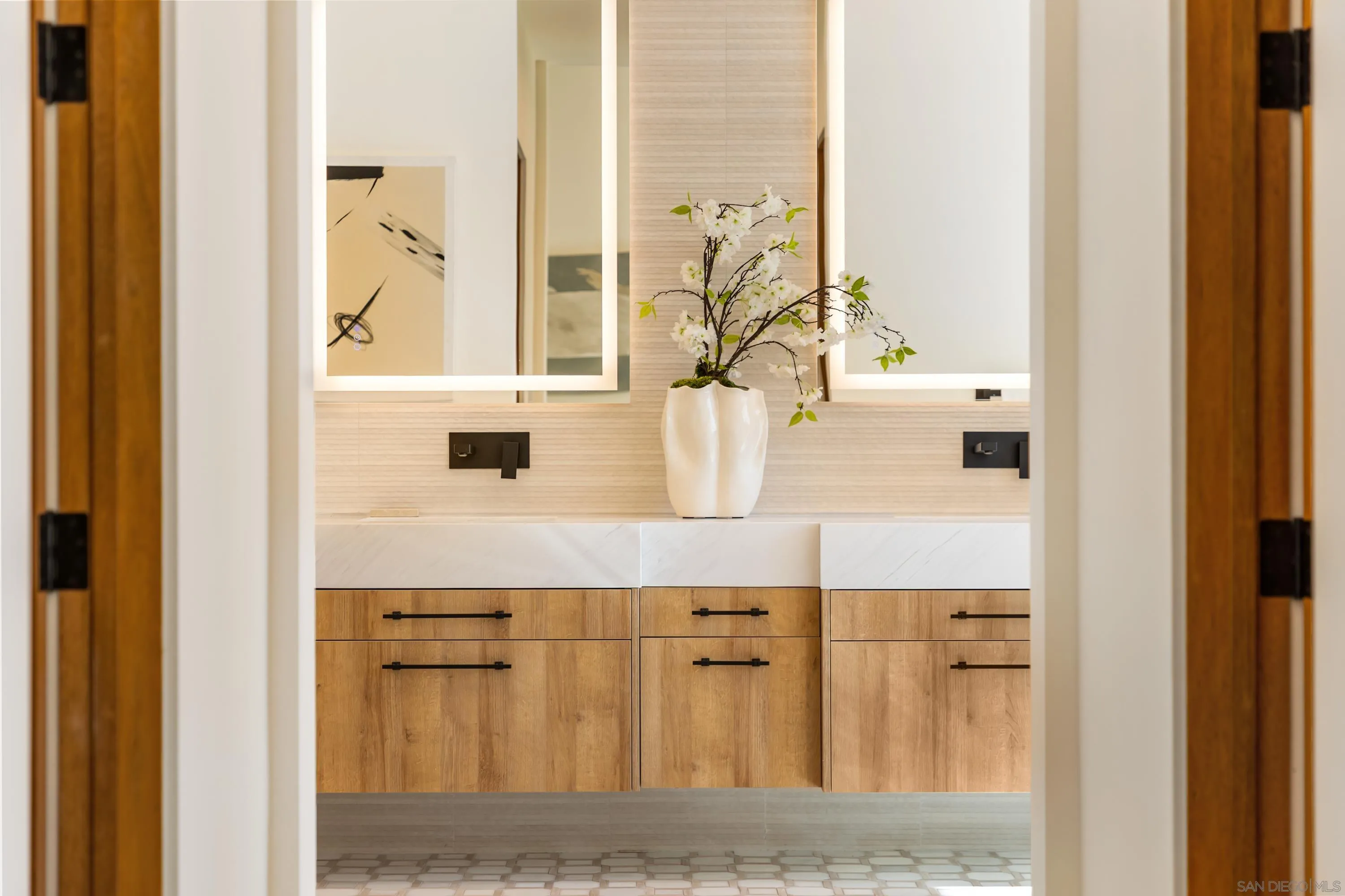 5758-60 Las Palomas Rancho Santa Fe, CA 92067 - Photo 45 of 64 a bathroom with a sink vanity and a mirror