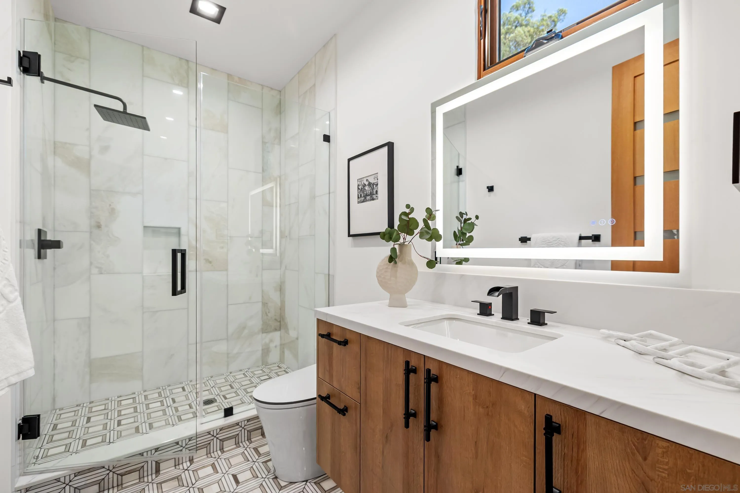 5758-60 Las Palomas Rancho Santa Fe, CA 92067 - Photo 52 of 64 a bathroom with a sink toilet and shower