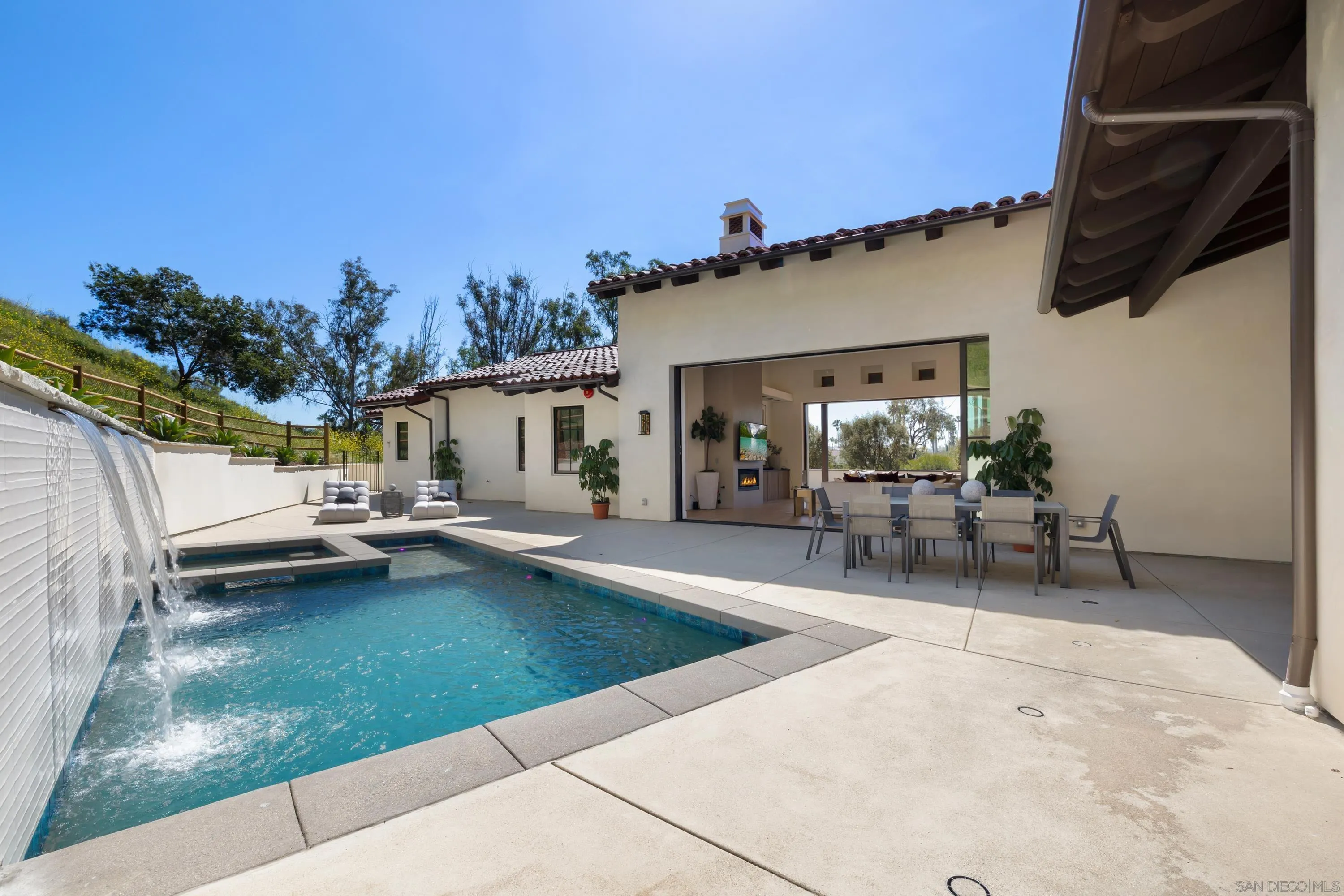 5758-60 Las Palomas Rancho Santa Fe, CA 92067 - Photo 56 of 64 a view of a patio with swimming pool table and chairs