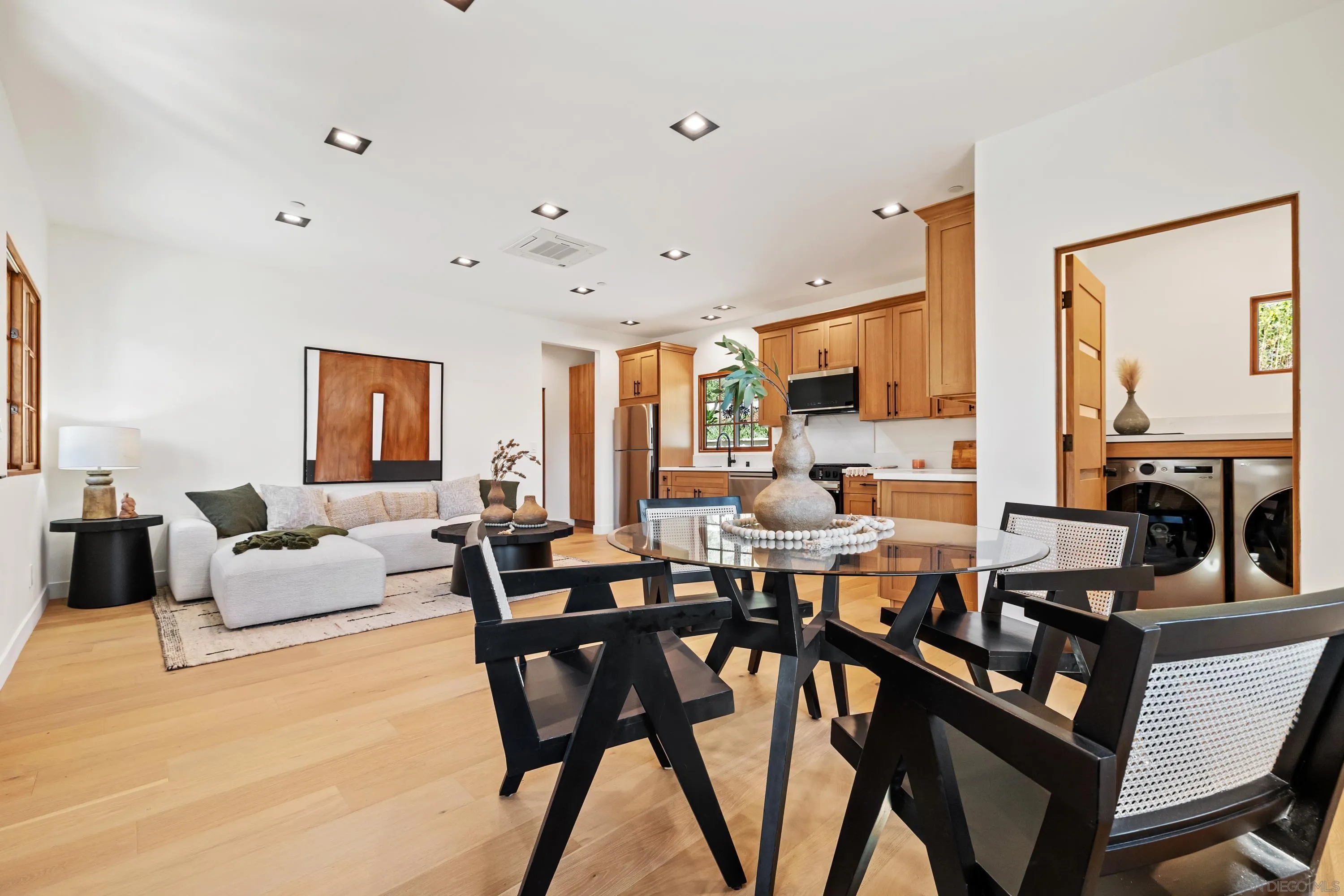 5758-60 Las Palomas Rancho Santa Fe, CA 92067 - Photo 61 of 64 a living room with lots of furniture and a large window