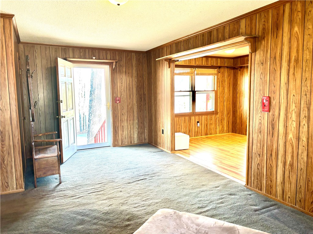 112 Ross Drive Starr, SC 29684 - Photo 17 of 23 This inviting space features a welcoming entryway with classic paneling, leading to a bright adjacent room.
