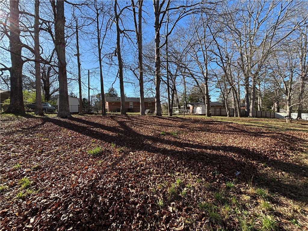 112 Ross Drive Starr, SC 29684 - Photo 23 of 23 This spacious lot features mature trees, offering privacy and natural beauty.