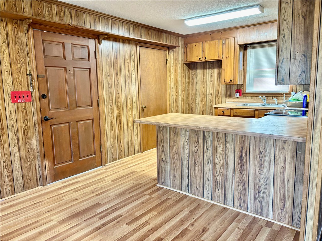 112 Ross Drive Starr, SC 29684 - Photo 4 of 23 This cozy kitchen offers a charming breakfast bar that's perfect for casual dining.