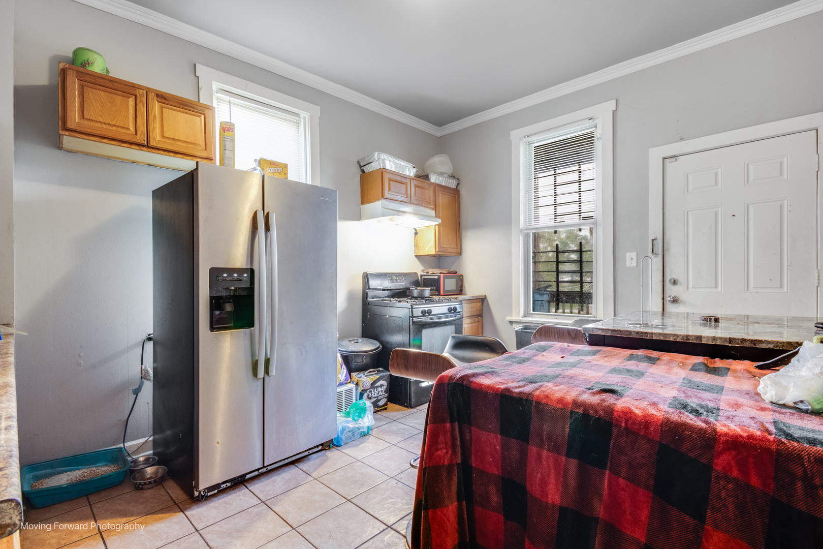 817 West 54th Street Chicago, IL 60609 - Photo 20 of 29 a bedroom with a bed and a window