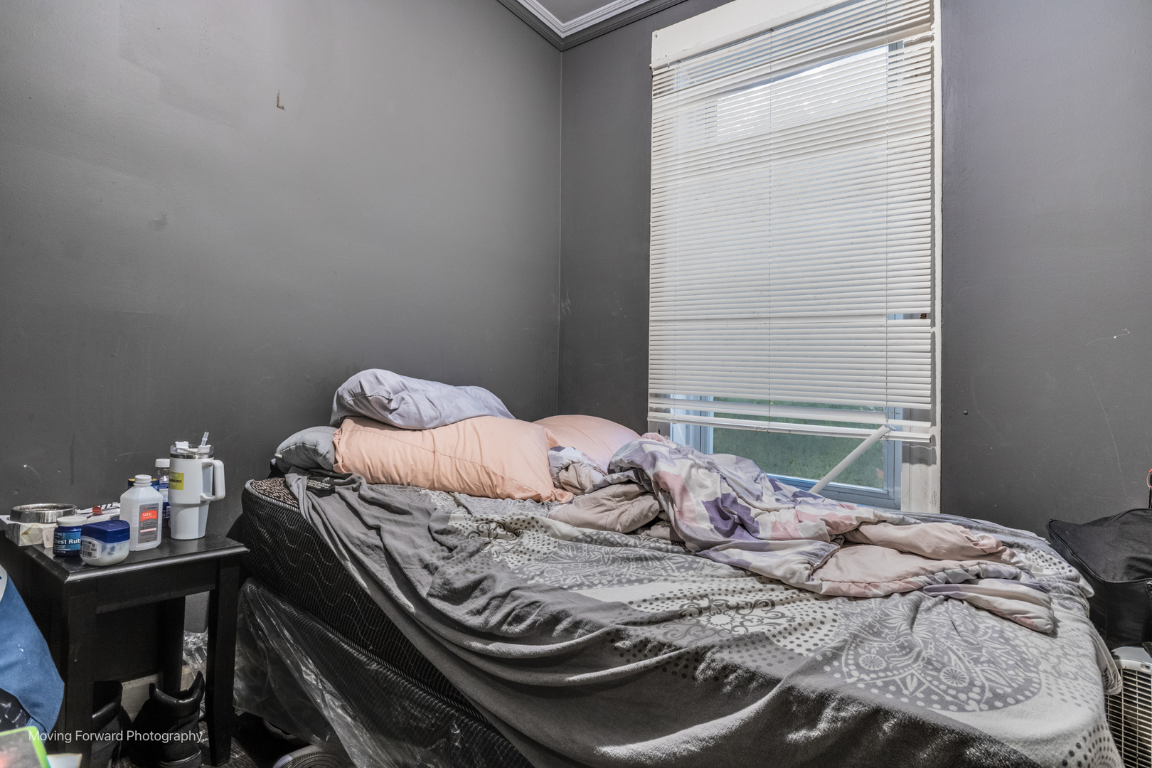 817 West 54th Street Chicago, IL 60609 - Photo 23 of 29 a bedroom with a bed and a window