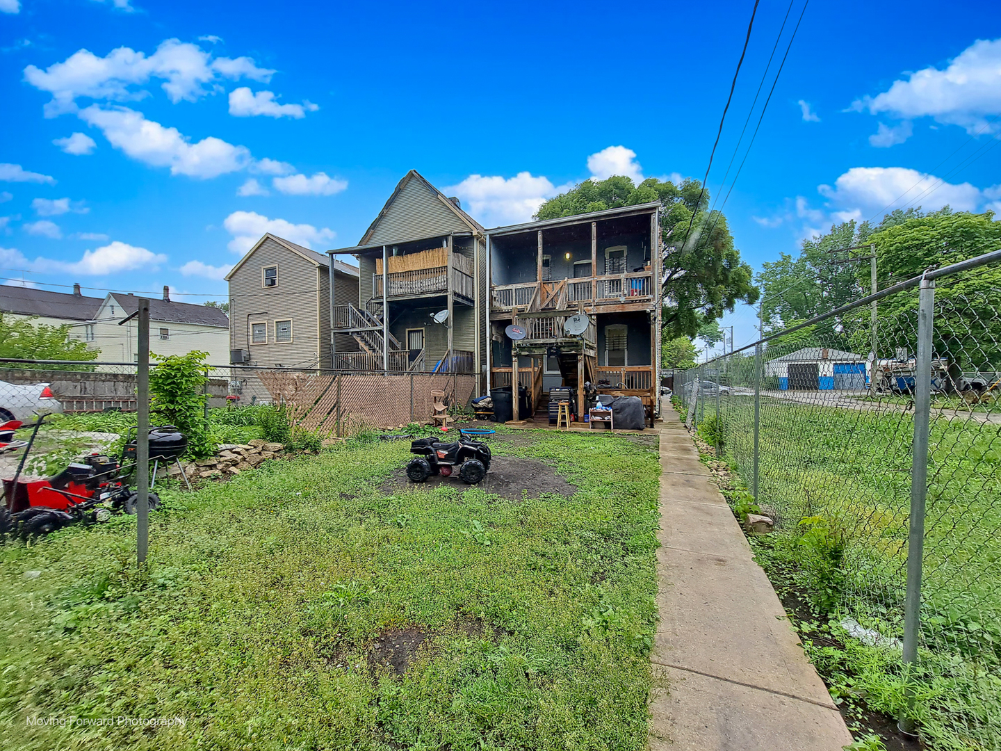 817 West 54th Street Chicago, IL 60609 - Photo 4 of 29 a front view of a house with a yard
