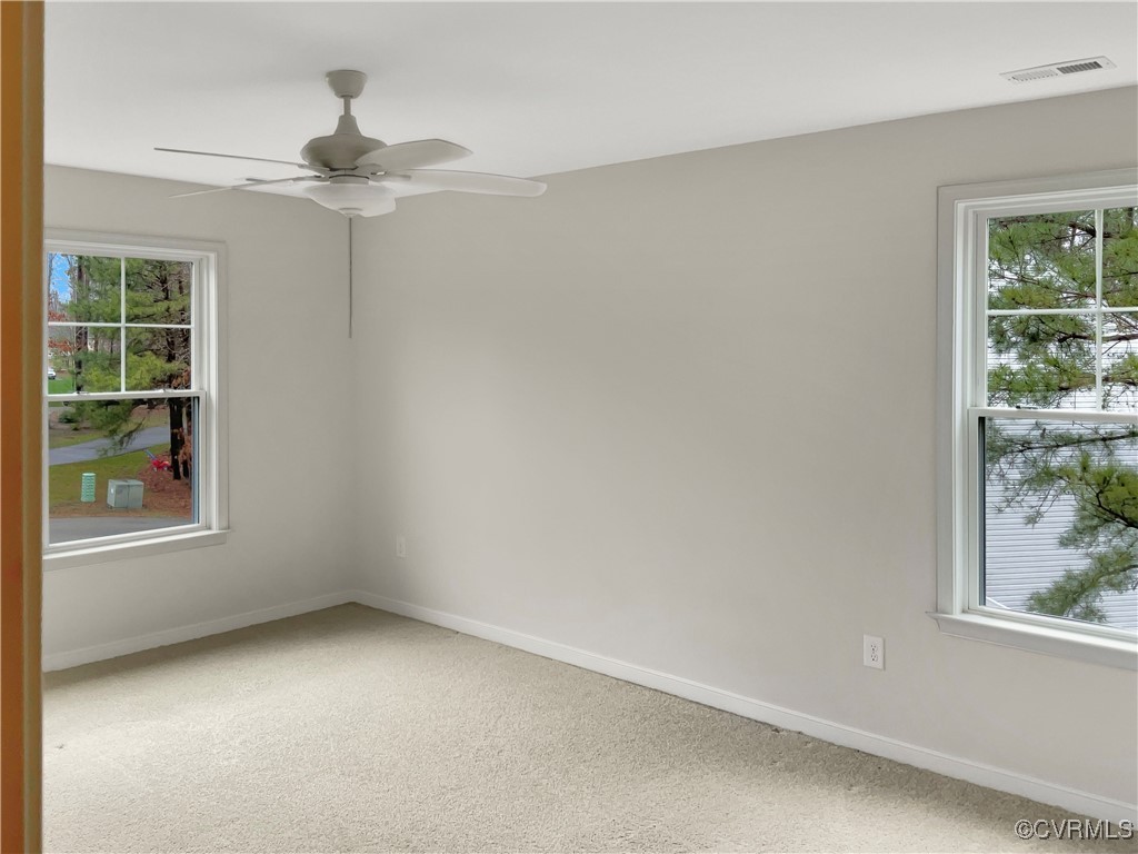2206 White Oak Circle Aylett, VA 23009 - Photo 17 of 25 an empty room with windows