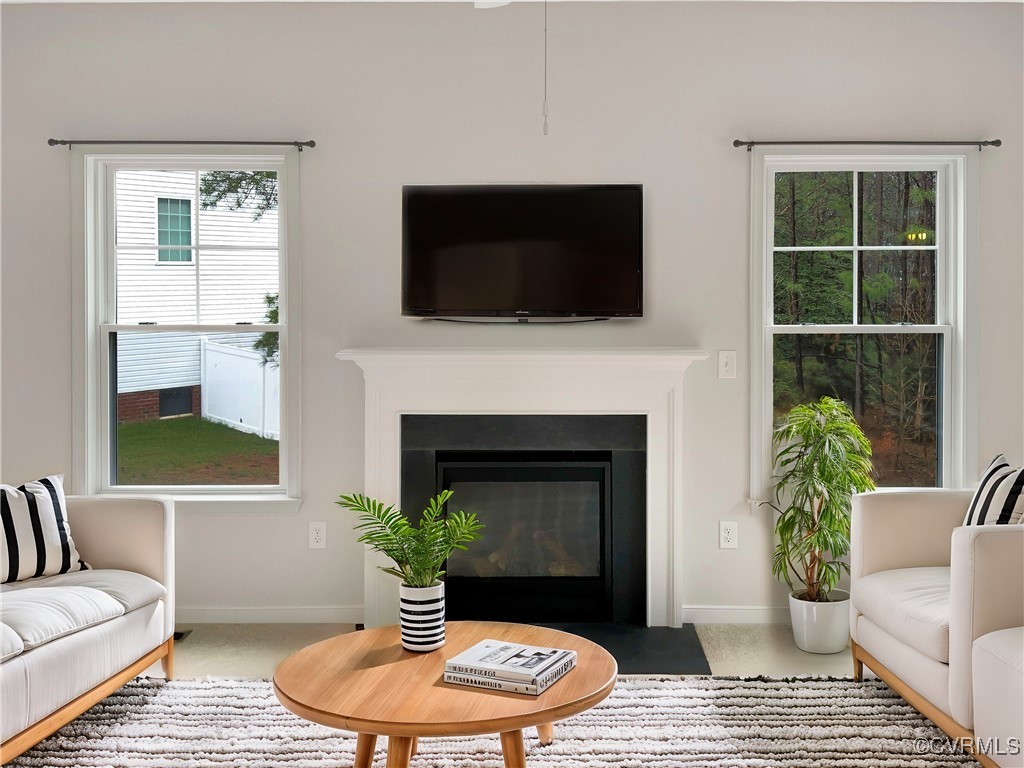 2206 White Oak Circle Aylett, VA 23009 - Photo 2 of 25 a living room with furniture and a fireplace